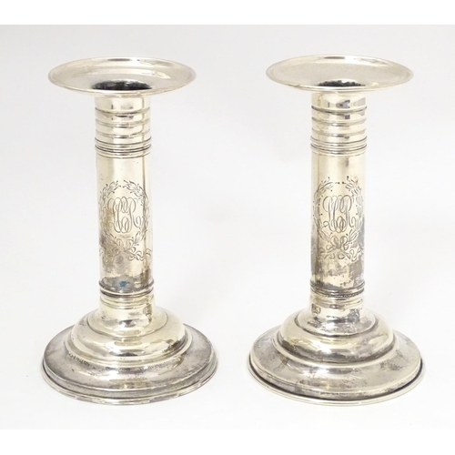 494 - A pair of American silver candlesticks, maker Meriden Britannia & Co. Approx. 5 3/4