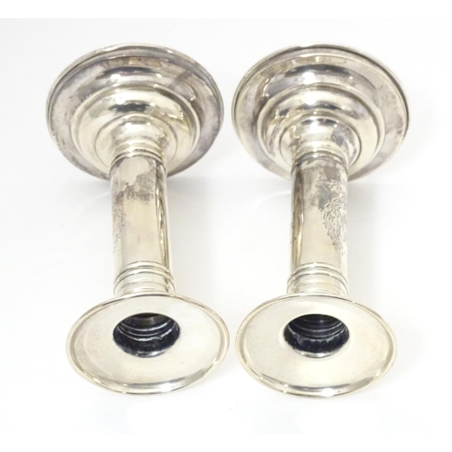 494 - A pair of American silver candlesticks, maker Meriden Britannia & Co. Approx. 5 3/4