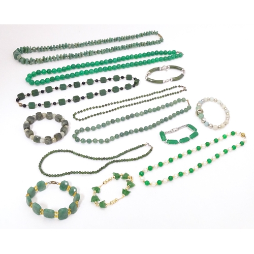 719 - Assorted bead jewellery to include necklaces and bracelets set with various green hardstone and glas... 