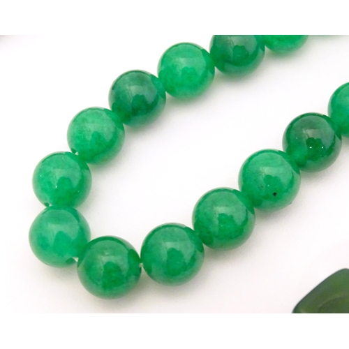 719 - Assorted bead jewellery to include necklaces and bracelets set with various green hardstone and glas... 