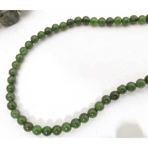 719 - Assorted bead jewellery to include necklaces and bracelets set with various green hardstone and glas... 