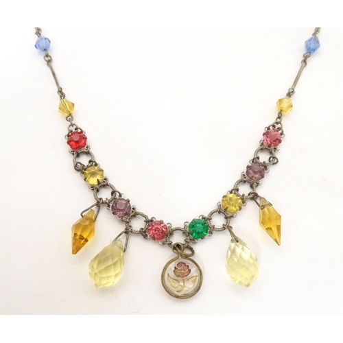 721 - A white metal necklace with various coloured facet cup beads and drops, etc. Approx. 16