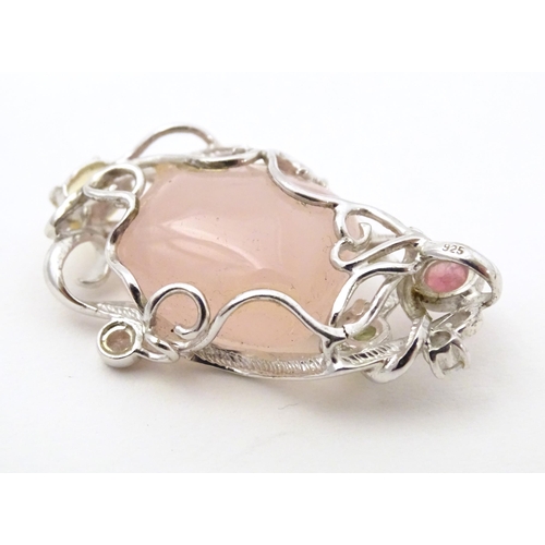 733 - A .925 silver pendant set with central rose quartz and various coloured stone. Approx. 1 3/4