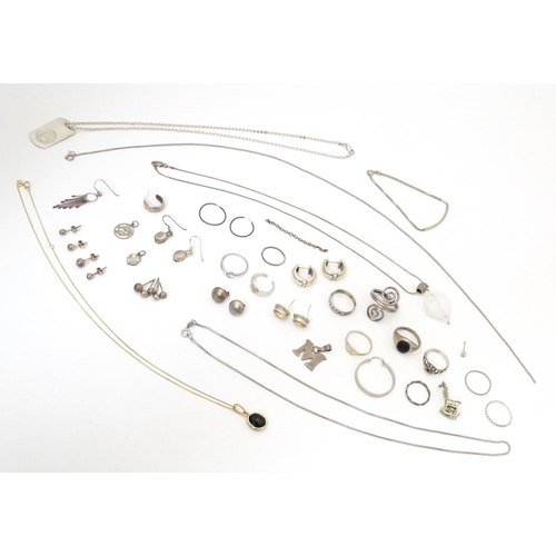 737 - Assorted silver and white metal jewellery to include various rings, earrings, pendants, etc.