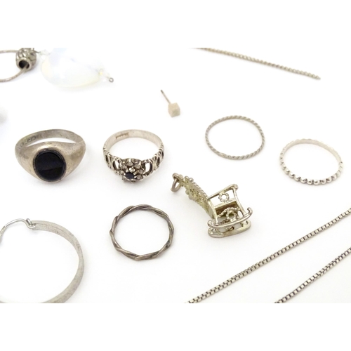 737 - Assorted silver and white metal jewellery to include various rings, earrings, pendants, etc.