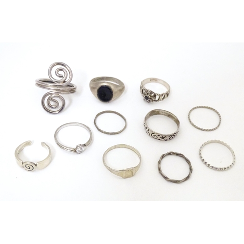 737 - Assorted silver and white metal jewellery to include various rings, earrings, pendants, etc.