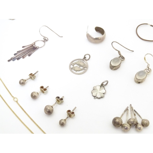 737 - Assorted silver and white metal jewellery to include various rings, earrings, pendants, etc.