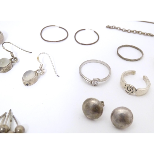 737 - Assorted silver and white metal jewellery to include various rings, earrings, pendants, etc.