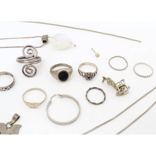 737 - Assorted silver and white metal jewellery to include various rings, earrings, pendants, etc.