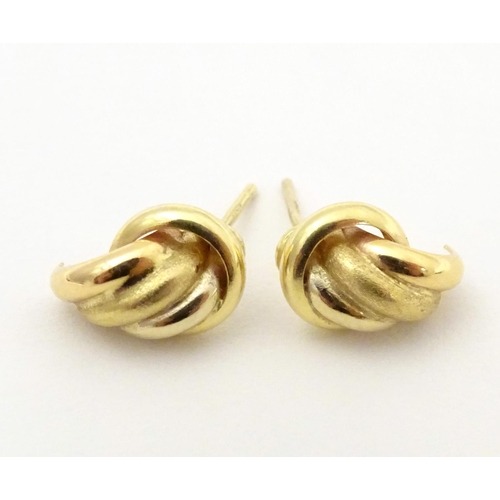 739 - A pair of 18ct gold stud earrings. Approx. 1/2