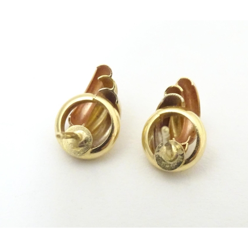 739 - A pair of 18ct gold stud earrings. Approx. 1/2