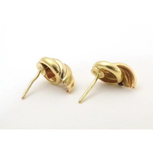 739 - A pair of 18ct gold stud earrings. Approx. 1/2