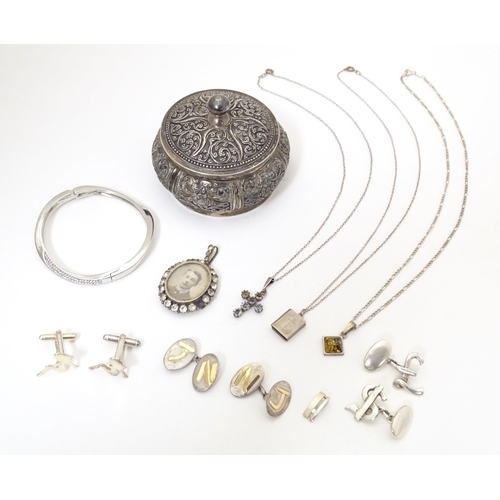 748 - Assorted items to include a silver chain, silver pendant of cross form set with tricolour paste ston... 