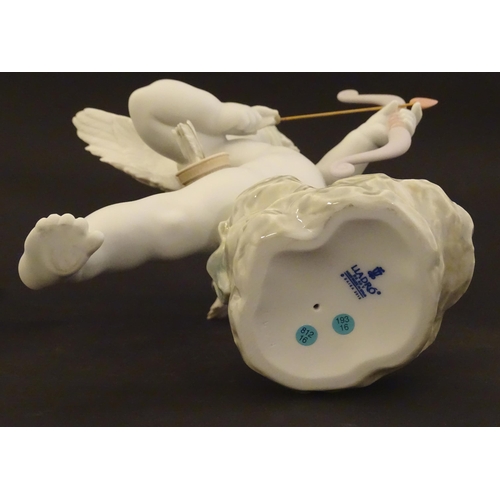 116 - A Lladro figure modelled as Cupid with bow, Straight to The Heart, model no. 9209. Marked under. Wit... 