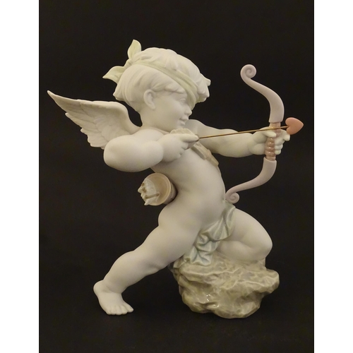 116 - A Lladro figure modelled as Cupid with bow, Straight to The Heart, model no. 9209. Marked under. Wit... 