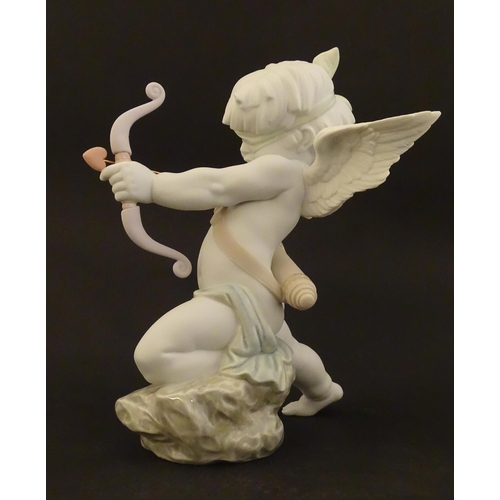 116 - A Lladro figure modelled as Cupid with bow, Straight to The Heart, model no. 9209. Marked under. Wit... 