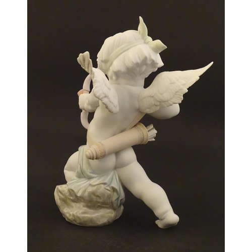 116 - A Lladro figure modelled as Cupid with bow, Straight to The Heart, model no. 9209. Marked under. Wit... 