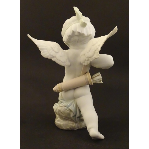 116 - A Lladro figure modelled as Cupid with bow, Straight to The Heart, model no. 9209. Marked under. Wit... 