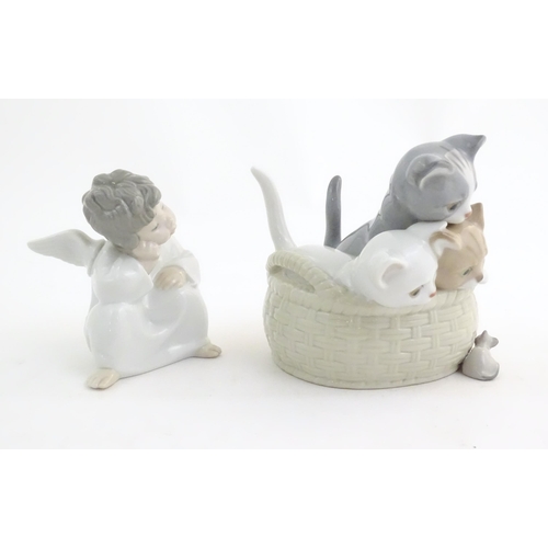 120 - Two Lladro figures comprising Thinking Angel, model no. 4539, and Curious Kittens, model no. 8693. M... 