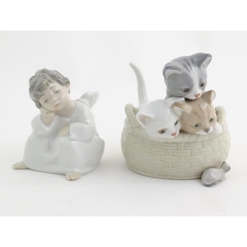 120 - Two Lladro figures comprising Thinking Angel, model no. 4539, and Curious Kittens, model no. 8693. M... 