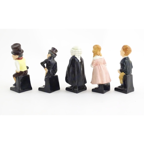 135 - A quantity of Royal Doulton figures to include Charles Dickens figures to include Sam Weller, Oliver... 