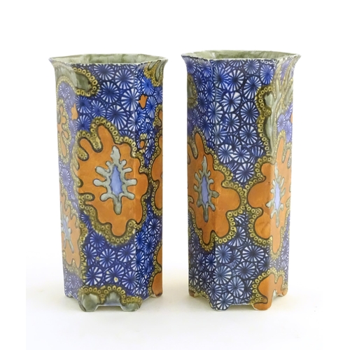 139 - A pair of Art Deco Bursley Ware hexagonal vases in the pattern Benares. Marked under. Approx. 8 1/2