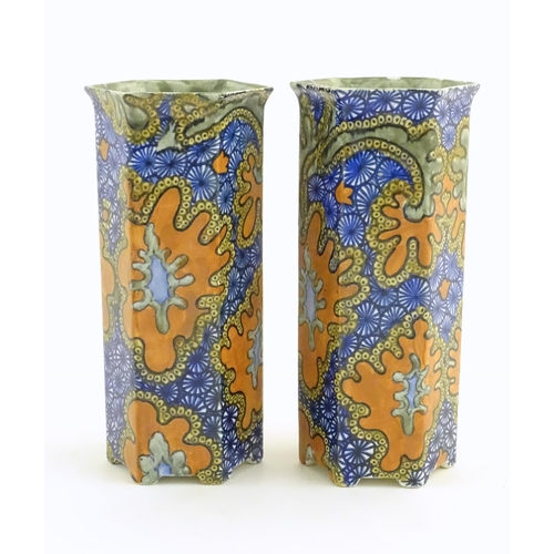 139 - A pair of Art Deco Bursley Ware hexagonal vases in the pattern Benares. Marked under. Approx. 8 1/2