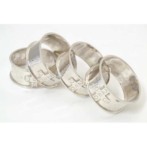 379 - Four silver napkin rings, hallmarked Birmingham 2000, maker possibly Links of London (4)