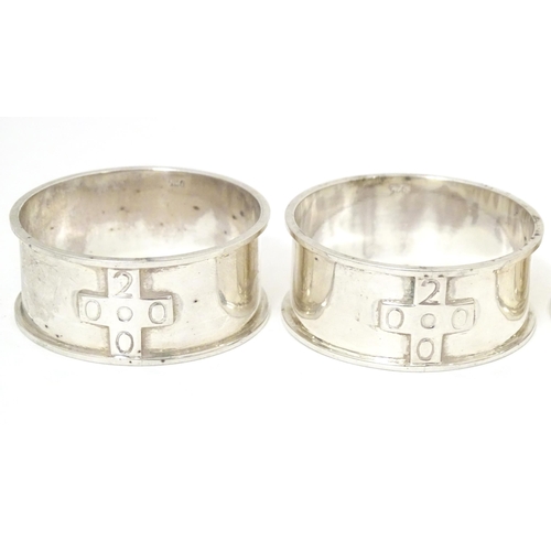 379 - Four silver napkin rings, hallmarked Birmingham 2000, maker possibly Links of London (4)