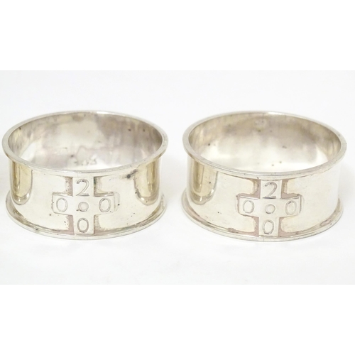 379 - Four silver napkin rings, hallmarked Birmingham 2000, maker possibly Links of London (4)