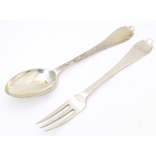 381 - A silver christening fork and spoon with trefid handles  hallmarked London 1911 maker Josiah William... 