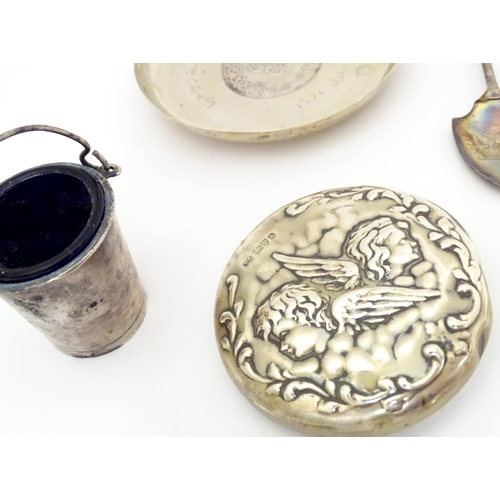 398 - Assorted silver, silver plate and white metal items to include a silver jar lid with embossed angel ... 