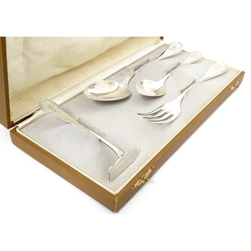 403 - A German .800 silver christening set comprising spoons and fork. Marked N. W. Albers. Cased. Case ap... 