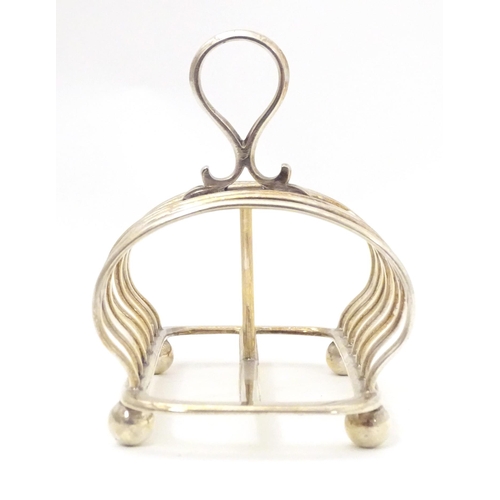 516 - A silver plate seven bar toast rack. Approx. 5 1/4