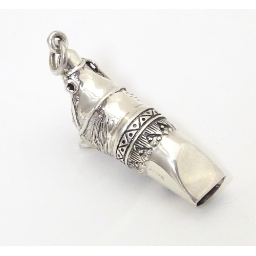 529 - A white metal novelty whistle modelled as a horse. Approx. 1 3/4