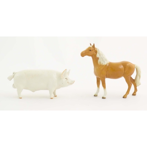 145 - A Beswick model of a pig / boar Ch. Wall Champion Boy, model no. 1453A. Together with a Beswick mode... 