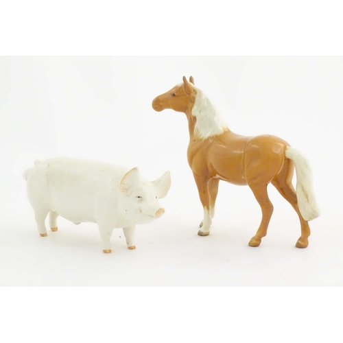 145 - A Beswick model of a pig / boar Ch. Wall Champion Boy, model no. 1453A. Together with a Beswick mode... 