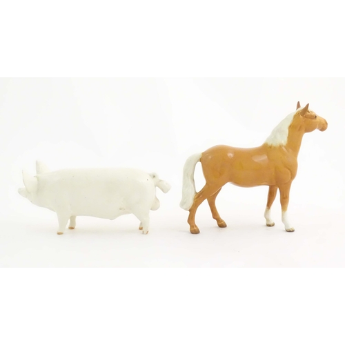 145 - A Beswick model of a pig / boar Ch. Wall Champion Boy, model no. 1453A. Together with a Beswick mode... 