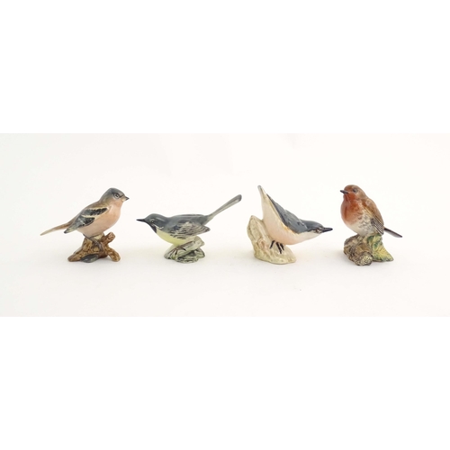 146 - A quantity of Bewsick models of birds, to include Blue Tit, model no. 992, Songthrush, no. 2308, Cha... 