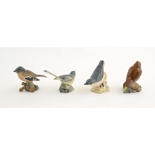 146 - A quantity of Bewsick models of birds, to include Blue Tit, model no. 992, Songthrush, no. 2308, Cha... 