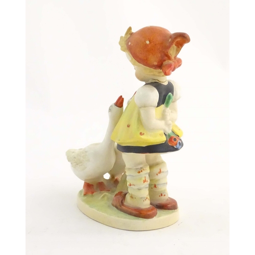 148 - A Beswick Hummel / Goebel figure modelled as a young girl with two geese, Good Girl, model no. 905. ... 