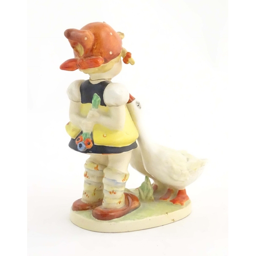 148 - A Beswick Hummel / Goebel figure modelled as a young girl with two geese, Good Girl, model no. 905. ... 