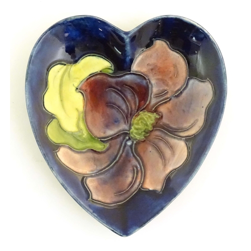 152 - A Moorcroft dish of heart form decorated in the Clematis pattern. Marked under. Approx. 5