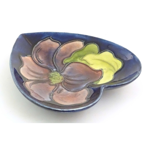 152 - A Moorcroft dish of heart form decorated in the Clematis pattern. Marked under. Approx. 5