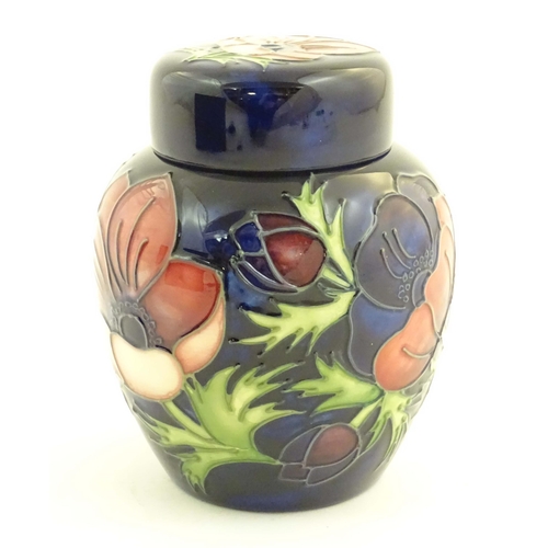 153 - A limited edition Moorcroft ginger jar in the Anemone pattern. Marked under with impressed jug and n... 