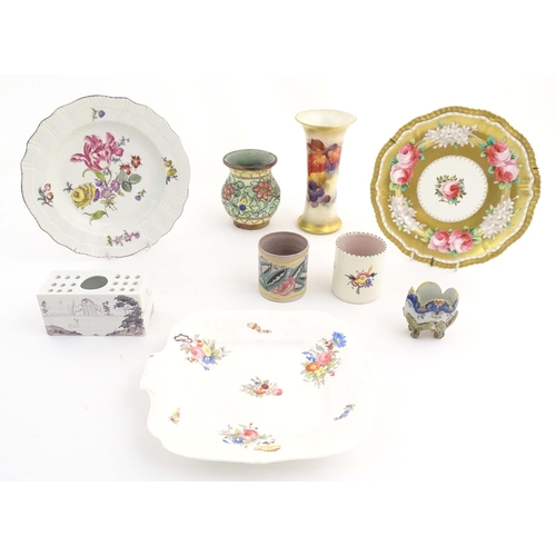 189 - A quantity of assorted ceramic items to include a Royal Worcester vase with a flared rim decorated w... 