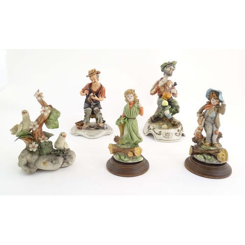 194 - Five Italian Capodimonte figures to include a cobbler, a seated tramp figure with a bottle, two bird... 