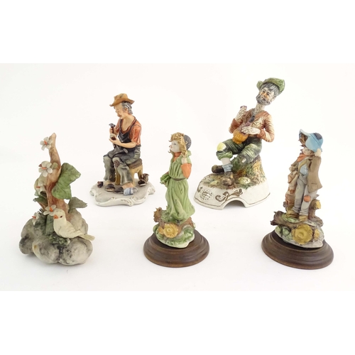 194 - Five Italian Capodimonte figures to include a cobbler, a seated tramp figure with a bottle, two bird... 