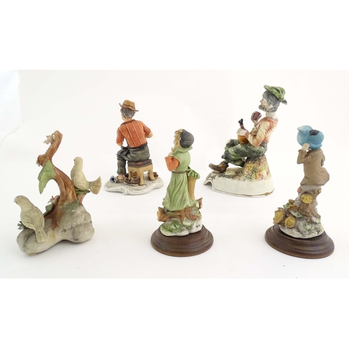 194 - Five Italian Capodimonte figures to include a cobbler, a seated tramp figure with a bottle, two bird... 