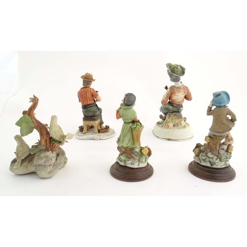 194 - Five Italian Capodimonte figures to include a cobbler, a seated tramp figure with a bottle, two bird... 